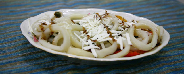 Insalata di calamari tiepida con glassa di balsamico e ricotta salata